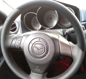 {{photo.Alt || photo.Description || 'Оплетка на руль из натуральной кожи Mazda 6-I (GG,GY) 2002-2007'}}