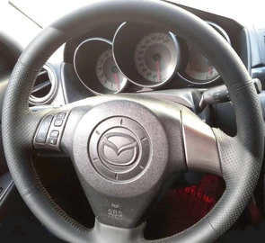 {{photo.Alt || photo.Description || 'Оплетка на руль из натуральной кожи Mazda 5-I (CR) 2007-2010'}}