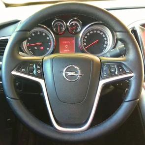 {{photo.Alt || photo.Description || 'Оплетка на руль из натуральной кожи Opel Astra J 2009-2015'}}