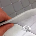стеганная серая винилискожа на поролоне - фото